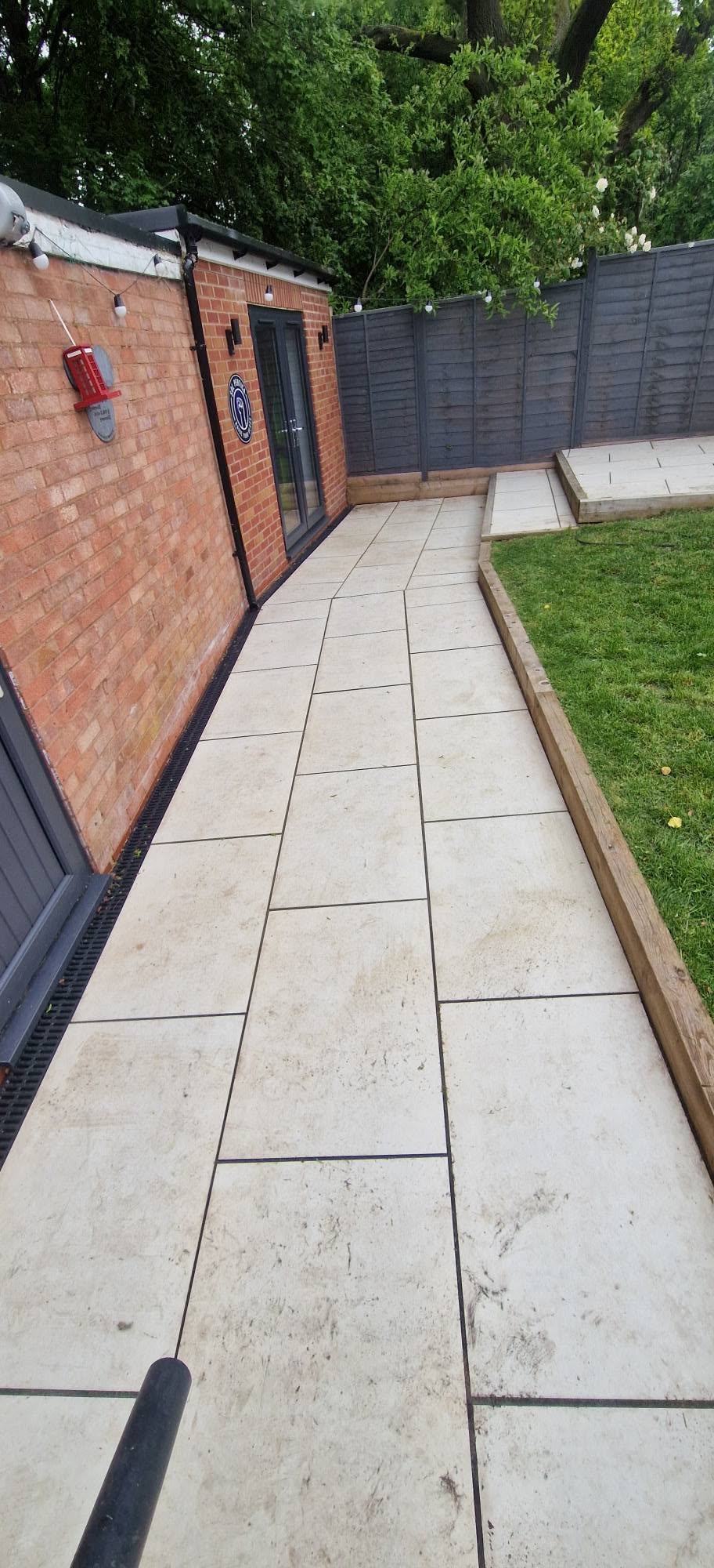 Restored sandstone patio after professional patio cleaning and rejointing in Redditch, Worcestershire