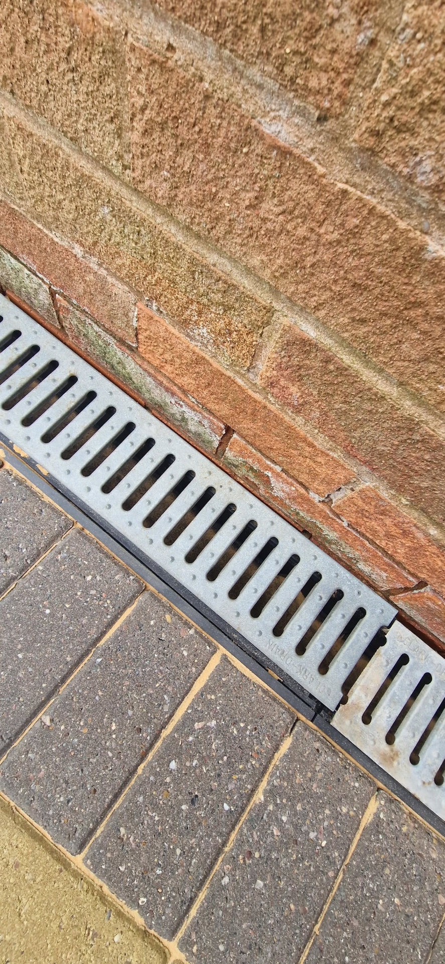 The same drainage channel cleared and free flowing after clearance