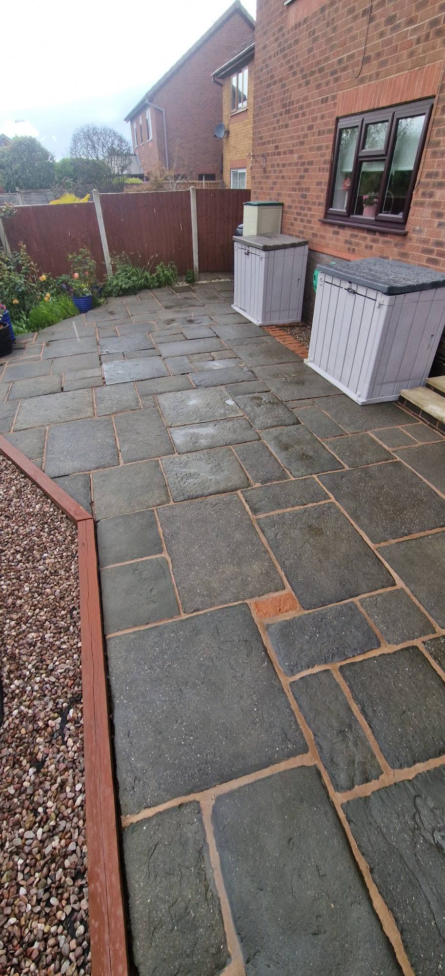 Restored sandstone patio after professional patio cleaning and rejointing in Redditch, Worcestershire